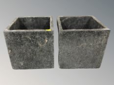 A pair of composition planters,
