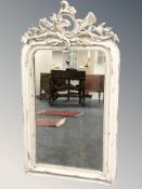 A continental 19th century painted mirror, 110 cm x 60 cm.