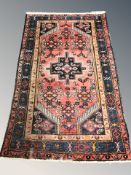 A Hamadan rug, North-West Iran, 231 cm x 137 cm.