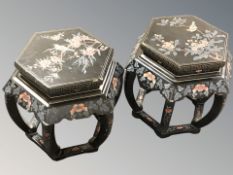 A pair of reproduction oriental lacquered hexagonal plant stands, height 47 cm.