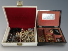 A Japanese lacquered trinket box containing costume jewellery,