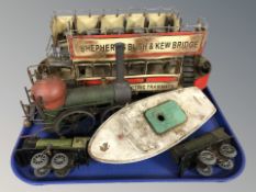Vintage toys including clockwork locomotive, tin plate model boat,