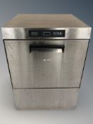 A stainless steel commercial dish washer,