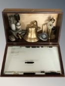 A wooden display case containing reproduction brass Titanic bell, further nautical related items,