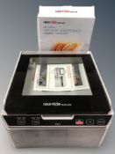 A Sous Vide vacuum sealer and bags,