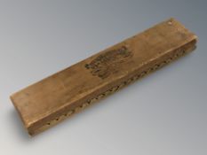 A wooden cigar mould