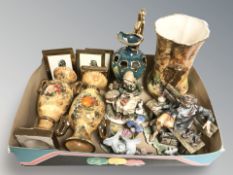 A group of ceramic ornaments, tramp figure,