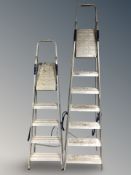Two aluminium step ladders.
