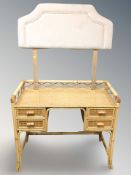A bamboo dressing table together with 3ft upholstered headboard.