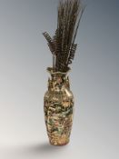 An Oriental style gilded vase with sticks