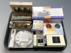 A group of un-used diffuser fragrances, luxury soap,