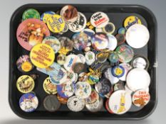 A group of vintage badges
