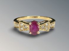 An 18ct gold ruby and diamond ring, size O CONDITION REPORT: 3.