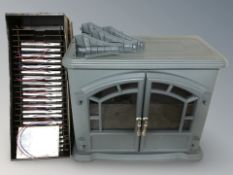 A contemporary electric fire in the form of a cast iron stove,