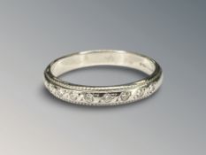 A platinum and diamond ring, size M CONDITION REPORT: 3.