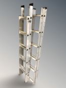 Two aluminium loft ladders.