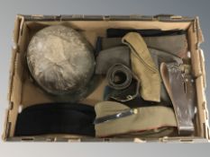 A box of military clothing, military helmet,