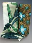 A box of two rolls of upholsterer's fabric