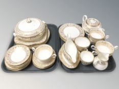 Two trays of Wedgwood Gold Florentine tea and dinner china.