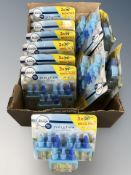 Twelve Febreze fragrance refill packs.
