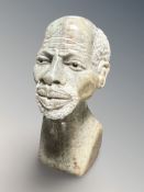 An African carved stone bust of a man, height 12 cm.