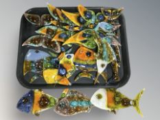 A group of glass fish ornaments