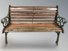 A garden bench with metal ends, width 127 cm.