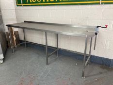 A stainless steel preparation table, 254 cm W x 70 cm D x 96 cm H,