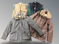 A group of four items of clothing to include Barbour jacket lining, lady's coats, fleece coat.