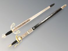 Two decorative Spanish style swords, length 72 cm.