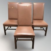 Four contemporary high backed brown leather dining chairs