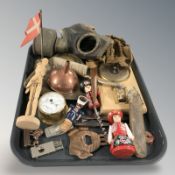 A group of collectables, bottle openers, barometer, wooden figure,