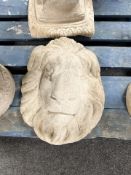 A concrete lion mask.