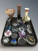 A group of glass paperweights,