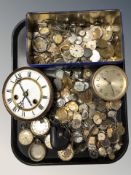 A large group of wristwatch movements, pocket watch movements and clock related parts.