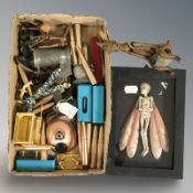 A group of collectables including reproduction bullets, trinkets, carved figure,