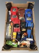 A box containing die cast cars and sports cars, Exclusive First Edition bus, etc.