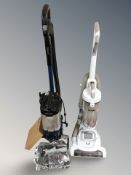 A Shark vacuum with accessories, together with a Goblin vac.