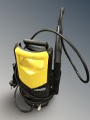 A Karcher pressure washer.
