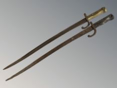A French Chassepot sword bayonet, with brass hilt and 57 cm blade,