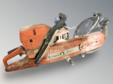 A Husqvarna concrete cutter wet saw.