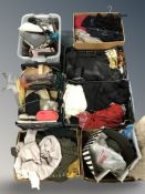 A pallet containing hand bags, clothing,