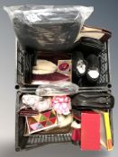 A crate containing unused shoes, slippers, wallets, etc.