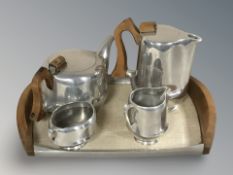 A four piece picquot ware tea service with tray