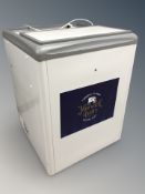 A commercial ice cream freezer,