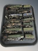 A group of locomotive engines with tenders,