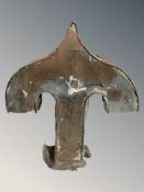 A metal finial, height 46 cm.
