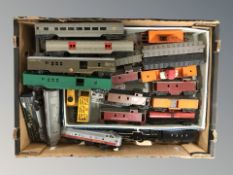 A box of model railway related carriages,