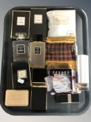 A group of Coco Chanel eau de parfums (opened), a further bar of soap, a Harrods silk scarf,