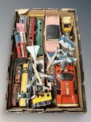 A box containing a quantity of die cast and plastic figures, model buses, sports car, aircraft,